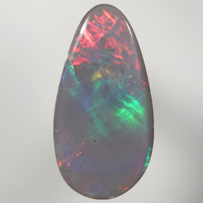 SOLID SEMI BLACK OPAL Large and bright red rolling flash turns to green in a Flame pattern